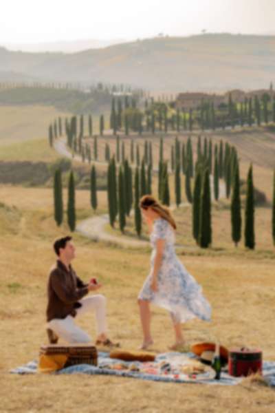 Sunset Picnic Proposal Among the Baccoleno Cypress Trees