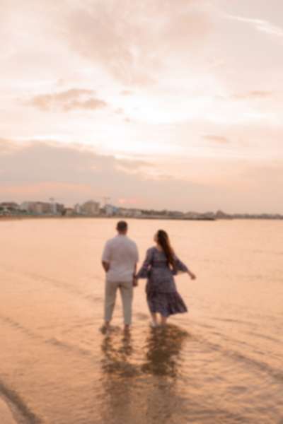 Rimini Seaside Sunset Proposal on the Rocks